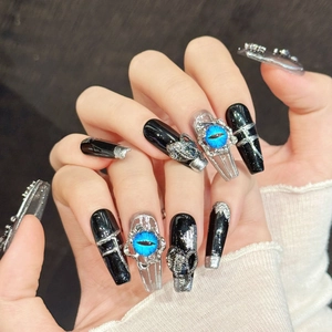 Gothic black coffin press-on nails with silver metal relief and blue evil eye charms