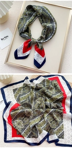 Detailed paisley pattern on elegant satin silk square scarf with vibrant red v-stripes