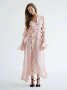 Light pink chiffon maxi dress with ruffled V-neck and asymmetrical hemline for summer