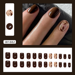 Vintage brown shimmer press-on nails with leaf art and gold foil accents in 24-piece set
