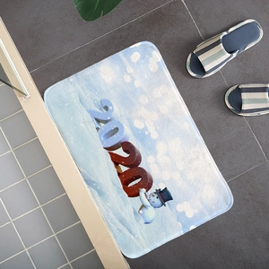 Absorbent flannel bath mat with 2020 snowman winter snow scene on grey tile floor