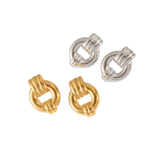 Polished titanium steel knot hoop earrings set in gold and silver finish on white background