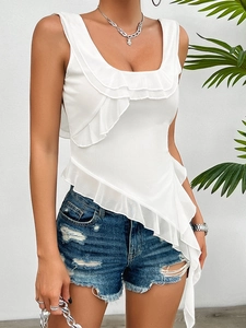 Close-up of white ruffle trim and asymmetric hem on y2k sleeveless camisole top