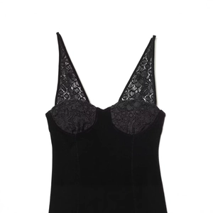 Elegant black velvet V-neck dress with intricate lace patchwork and camisole straps