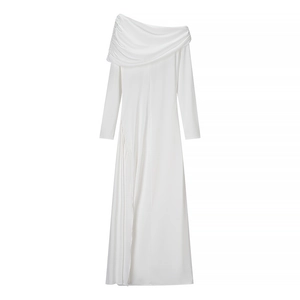 Detail of elegant white long sleeve dress with asymmetrical draped pleated shoulder detail