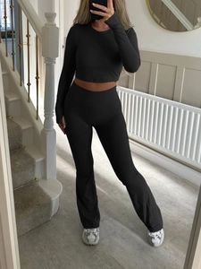 Y2K tight long sleeve crop top and high waist flared yoga pants set in black stretch fabric