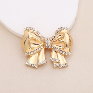 Golden bow charm with sparkling rhinestones for shoe decoration and DIY crafts