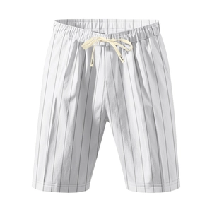 Detail of white linen shorts with grey vertical stripes and drawstring elastic waist
