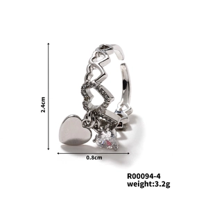 Macro detail showing heart-shaped hollow ring with zircon pendant measurements