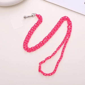 Detail of a rose red acrylic crossbody phone chain with a silver metal lobster clasp