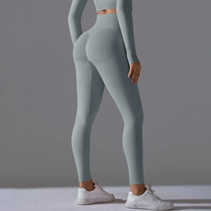 Detail view of seamless peach lift yoga leggings with high waist and breathable fabric