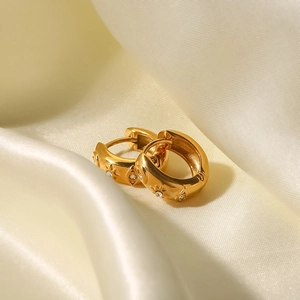 18k gold plated stainless steel chunky hoop earrings with zircon evil eye on white silk