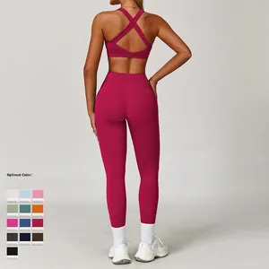 Completo yoga 2 pezzi rosa scuro con reggiseno sportivo incrociato e leggings a vita alta