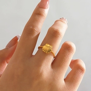 18K gold plated stainless steel ring featuring a shell design and woven texture