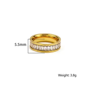 Polished gold stainless steel ring with rectangular zircons, 5.5mm width and 3.8g weight