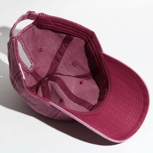 Washed cotton ponytail baseball cap in burgundy red with adjustable hole for high ponytails