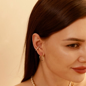 Elegant gold S925 sterling silver ear cuff and heart earrings set with sparkling crystals