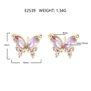 Macro view of gold butterfly earrings with purple zircons, 8mm by 10mm dimensions