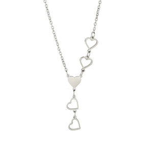 Detail of silver-tone Y-shaped necklace with polished solid and hollow heart charms