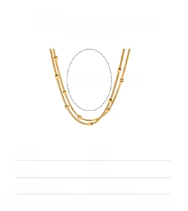 Detail view of 18K gold plated stainless steel double layer snake chain with cube beads