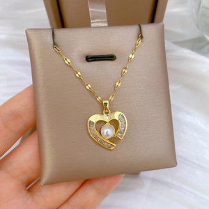 Gold-plated heart necklace with white pearl and pavé crystals in a luxury gift box