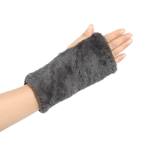 Detail of dark grey cable knit fingerless glove with plush faux fur lining for winter