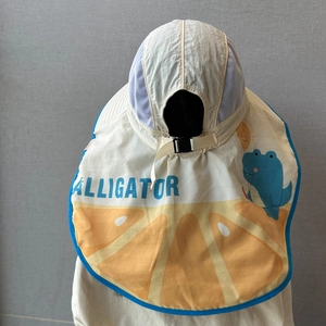 Rear view of kids sun hat featuring breathable mesh, cartoon print and a wide neck flap