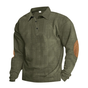 Detail view of corduroy texture and brown circular elbow patches on men's olive polo
