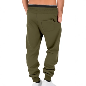 Men's olive green jogger pants with a ribbed cuff and back pocket in a loose fit style