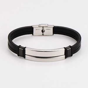 Macro shot of black multi-layer leather bracelet with polished stainless steel clasp