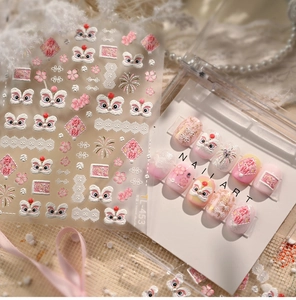 Detail of TL-453 pink lion dance nail stickers with floral patterns and gold accents