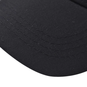 Detailed close-up of the cotton twill brim showing reinforced four-row stitching on the cap