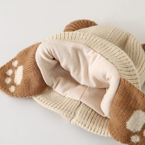 Winter knitted hat for kids with bear ears and soft cotton lining in beige and brown