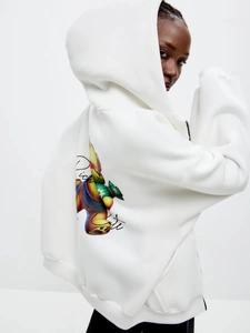 Detail view of white hoodie back featuring a colorful art bear print and Rich Cute text