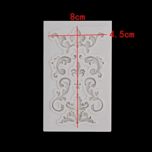 Baroque scroll relief silicone fondant mold showing dimensions 8cm by 4.5cm on black background