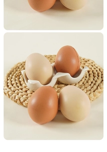 Detailed view of realistic PU foam eggs on a ceramic tray and woven mat background