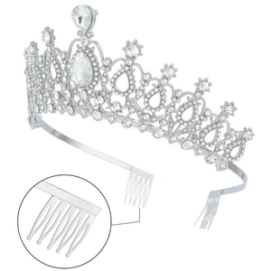 Close-up of silver crystal tiara showing intricate rhinestone patterns and side combs