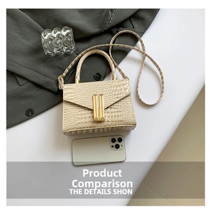 Top view of beige crocodile embossed crossbody bag with gold lock and sleek shoulder strap