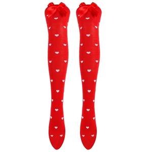 Detail of red knit thigh high socks with pink hearts and satin bow accents