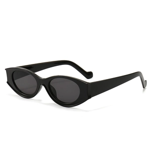 Modern black oval sunglasses with thick cat-eye frames and dark grey UV lenses