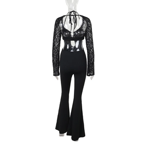 Detailed back view of black lace long sleeve top and slim fit flare pants set