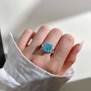 Detailed view of an elegant S925 silver ring featuring a square-cut blue zircon stone