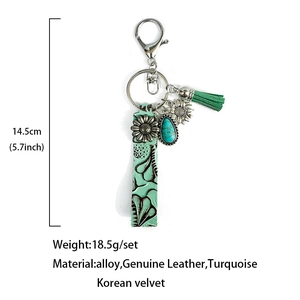Porte-clés vintage en cuir véritable et turquoise de style bohème avec breloques