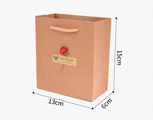 Brown kraft paper gift bag with red flower detail and dimensions 15x13x6cm shown clearly
