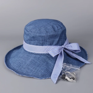 Navy blue striped bow sun hat with adjustable windproof rope for outdoor uv protection