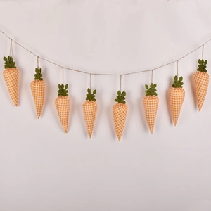 Detailed view of handmade fabric carrot banner with orange plaid patterns for Easter decor
