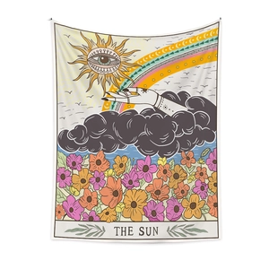 Detail of The Sun tarot tapestry showing colorful hand, rainbow and floral artwork