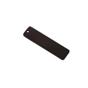 Close-up of a sleek black polished stainless steel rectangular pendant with a small hole