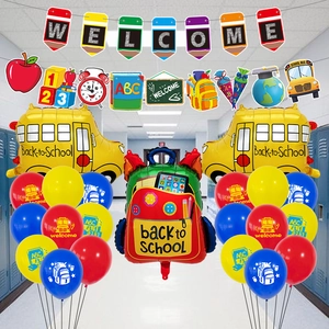 Detailed view of Back to School party set with bus balloons and pencil welcome banner