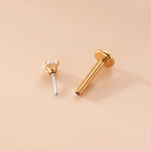 Piercing labret 16G de acero dorado con diseño hoja de corazón y circón brillante